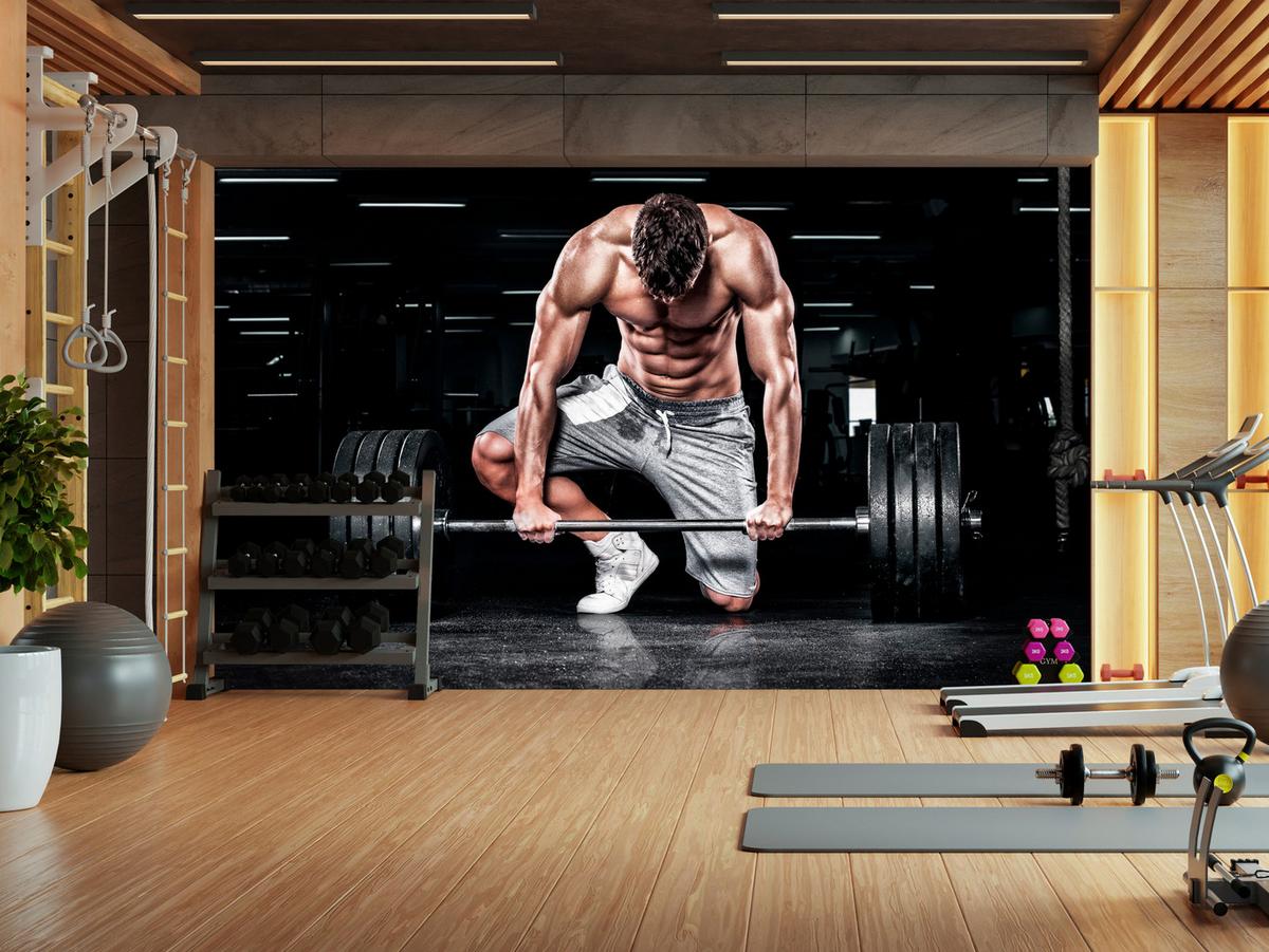 FOTOTAPETE Muskulöser Mann Fitnessstudio Training Sport 300x210 - Beige/Schwarz, Papier (300/210cm) - Muralo
