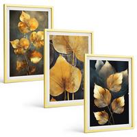 BILDER SET 3er Set - 40x60 cm Goldrahmen - Gelbe Blätter auf dunklem Hintergrund - Goldfarben, Kunststoff (40/60cm) - TULUP