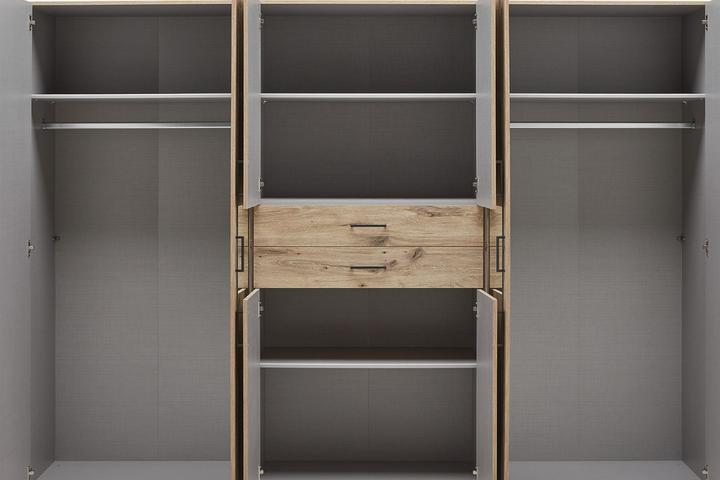 Drehtürenschrank Eichefarben 8 Drehtüren 4 verstellbare Einlegeböden 2 Schubladen 2 Kleiderstangen 2 Spiegel