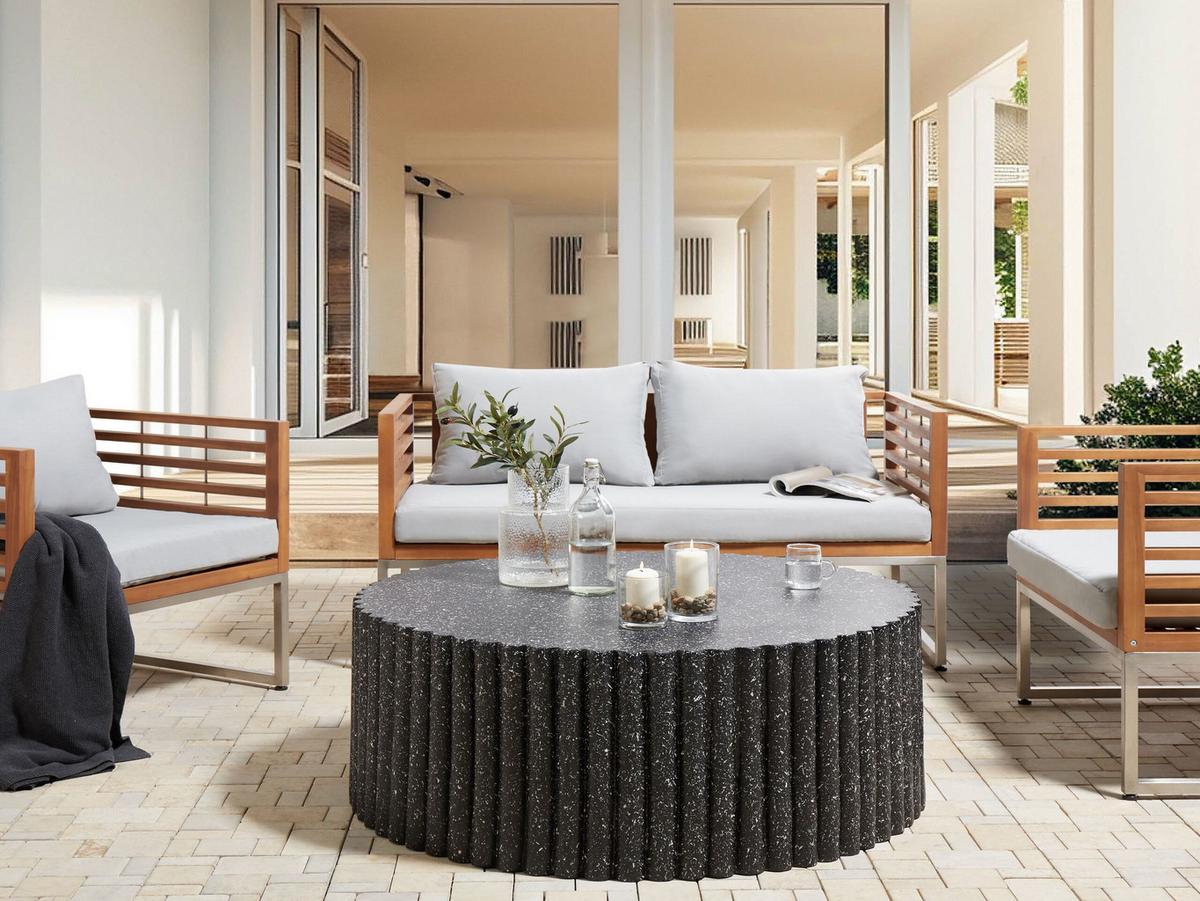 GARTEN Beistelltisch Beton Terrazzo Optik schwarz rund 106 cm Pozza - Schwarz, Stein (106/106/42cm) - Beliani