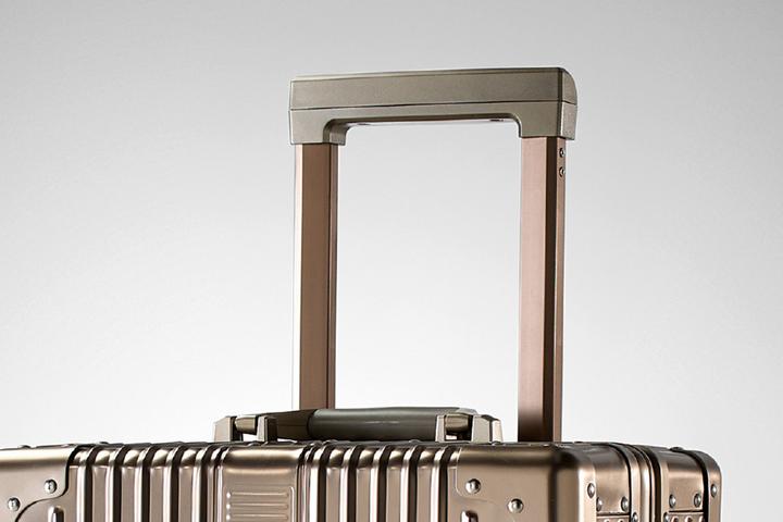 Reisekoffer gold ausziehbarer Teleskopgriff 360° Rollensystem Trolleyfunktion