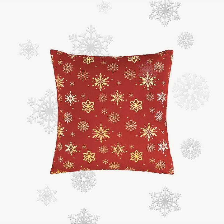 Rotes Kissen mit gelben Weihnachtssternen