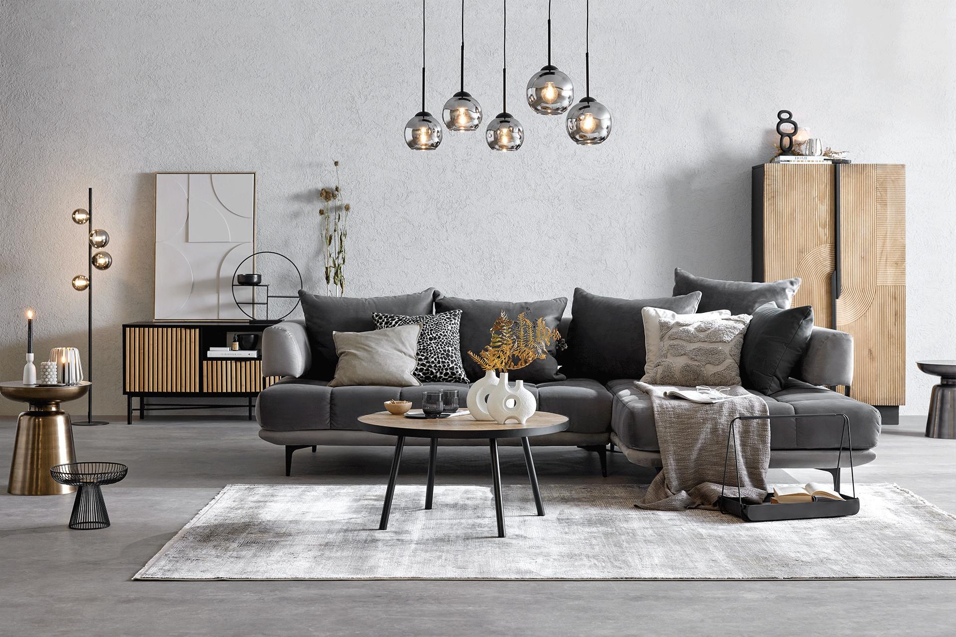 Wohnzimmer einrichten und den passenden Teppich dazu wählen.