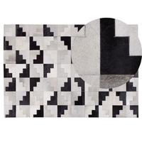 KURZFLOR-TEPPICH Efirli 200/140 cm - Schwarz, Fell (140/200cm) - Beliani