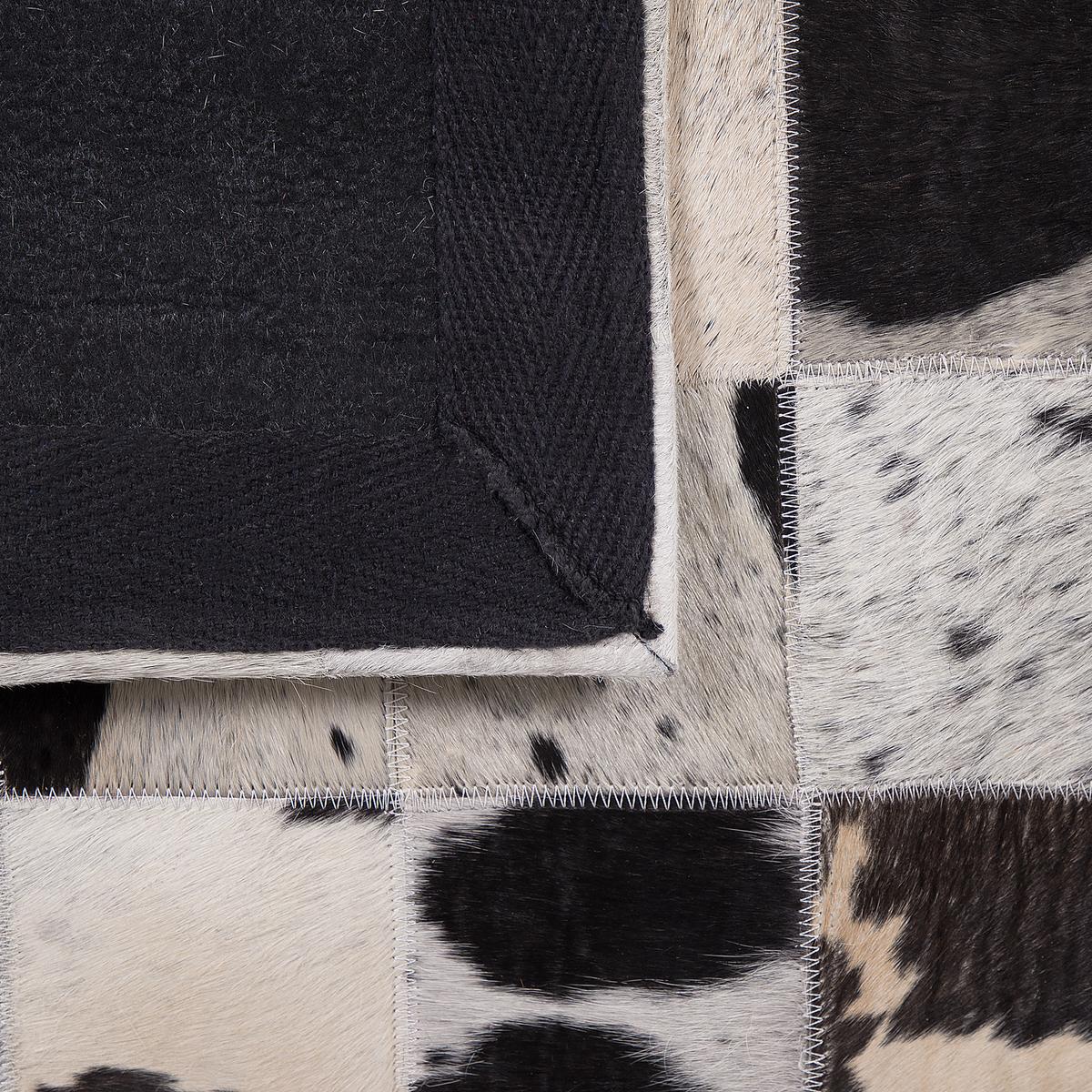 KURZFLOR-TEPPICH Kemah 200/140 cm - Schwarz, Fell (140/200cm) - Beliani