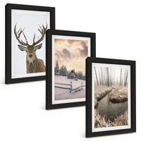 BILDER SET 3er Set - 20x30 cm Schwarzer Rahmen - Hirschhütte in Winterlandschaft - Schwarz, Kunststoff (20/30cm) - TULUP