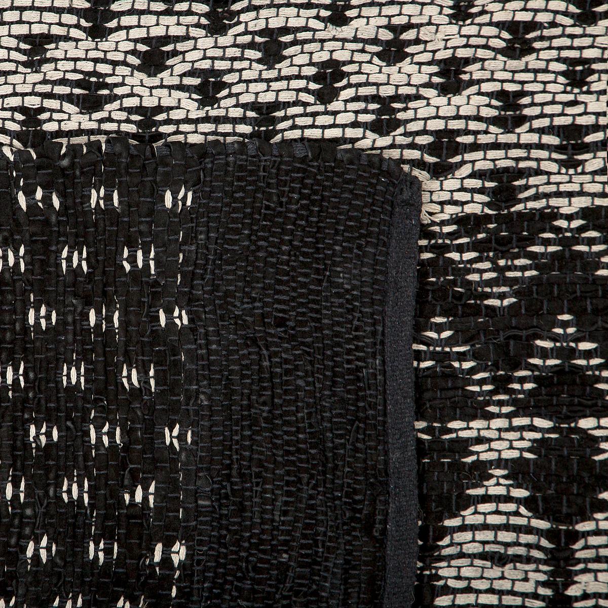 TEPPICH geflochten Sokun 200/140 cm - Schwarz, Fell (140/200cm) - Beliani