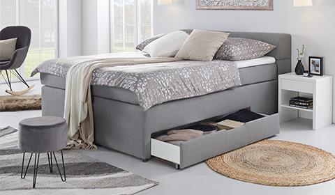 Komfortables Boxspringbett in Anthrazit mit ausreichend Stauraum von mömax.