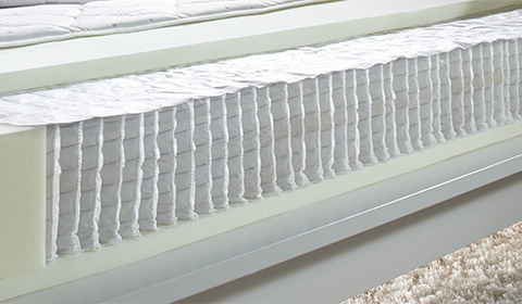Taschenfederkern-Innenleben einer Boxspring-Matratze von mömax.