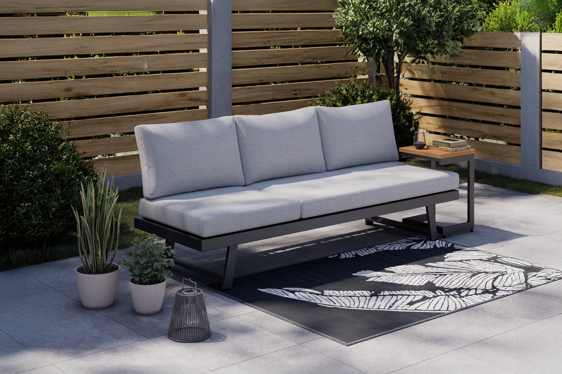 Schwarze Liege mit grauen Auflagen
