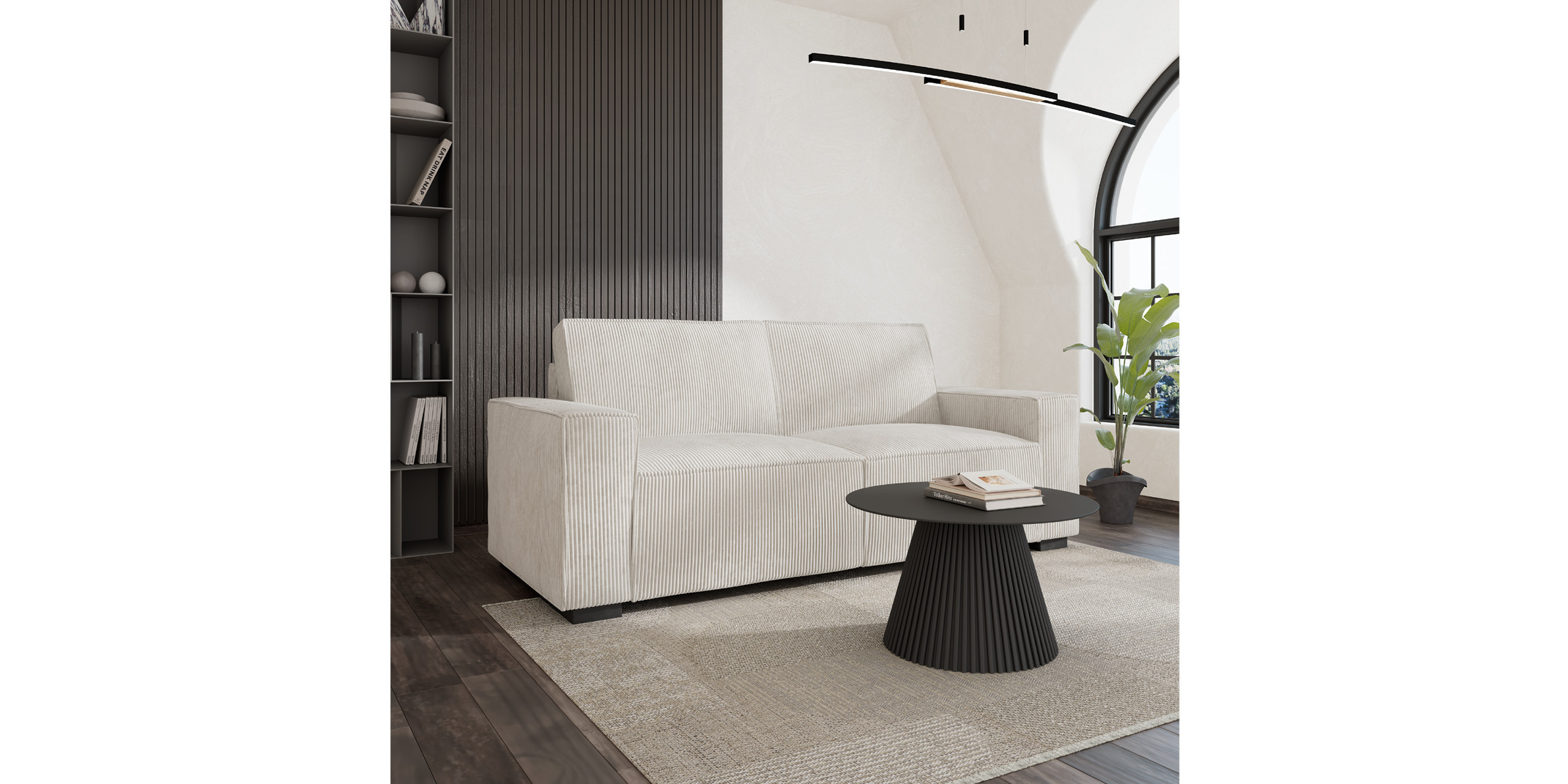 Weißes Sofa mit schwarzem runden Couchtisch