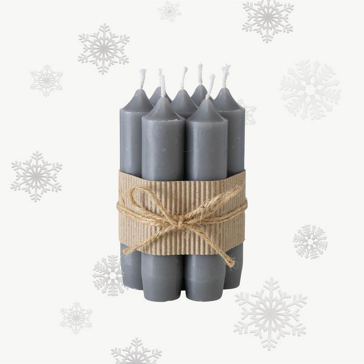 Graue Kerzen mit Papier zusammengebunden