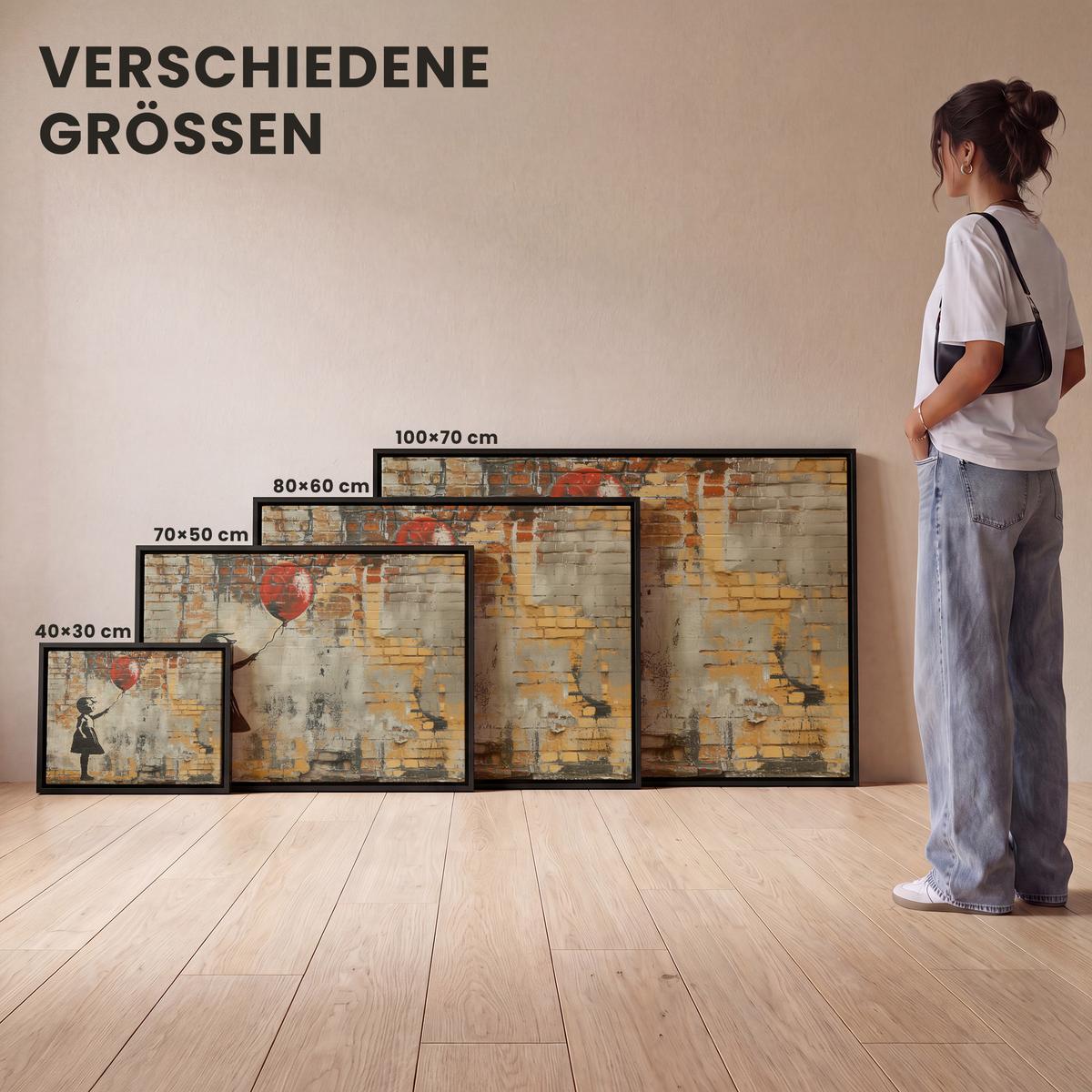 LEINWAND Bilder mit Rahmen - Graffiti - Banksy - Mädchen - Straßenkunst - 70x50 - Sandfarben, Textil (70/50cm) - MuchoWow