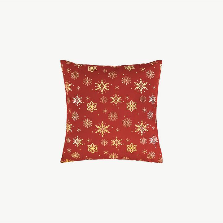 Rotes Kissen mit Weihnachtsmotiv