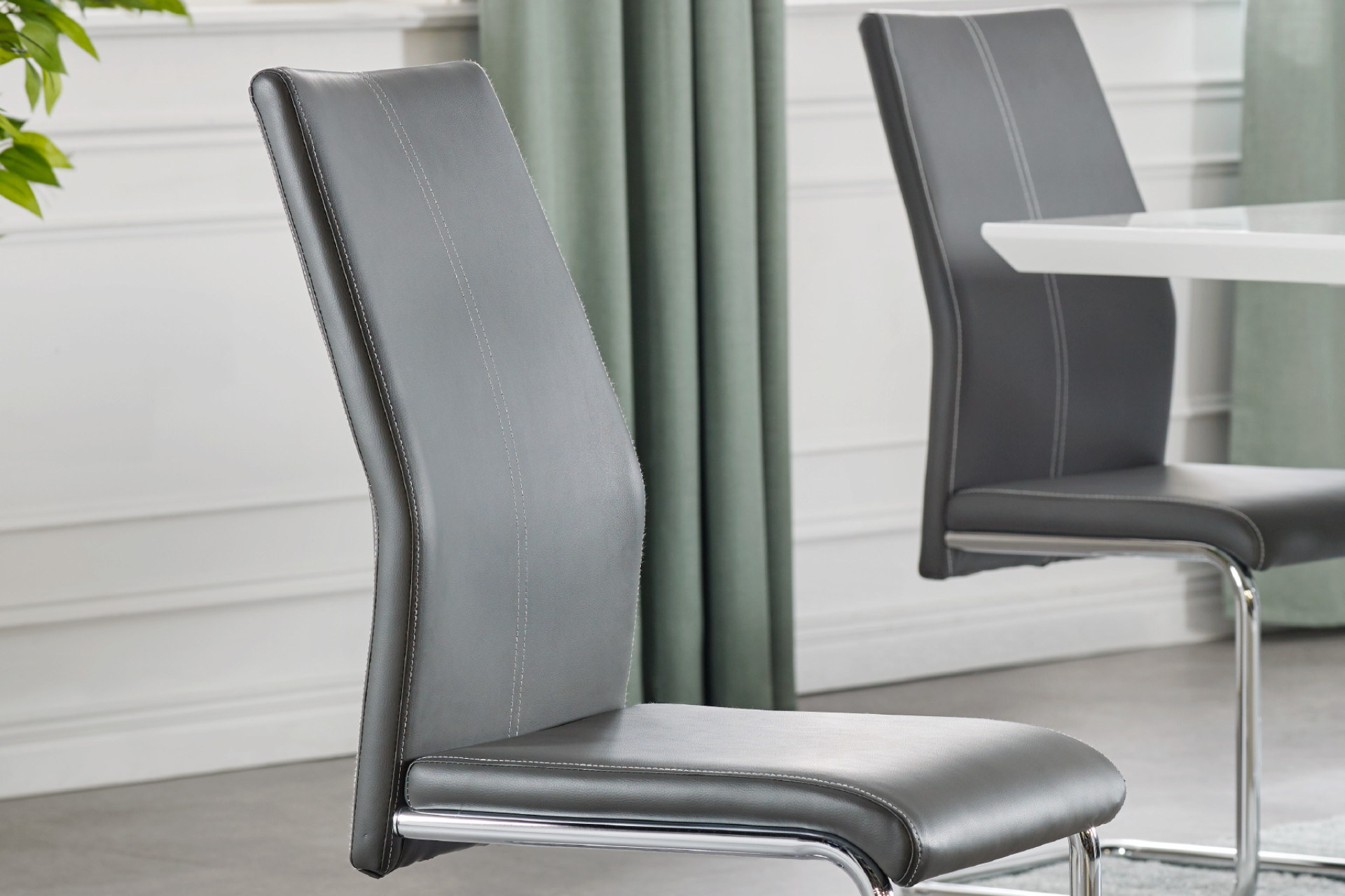 Schwingstuhl grau Lederlook Innenleben Schaumstoff