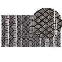 TEPPICH geflochten Fehimli 150/80 cm - Schwarz, Fell (80/150cm) - Beliani