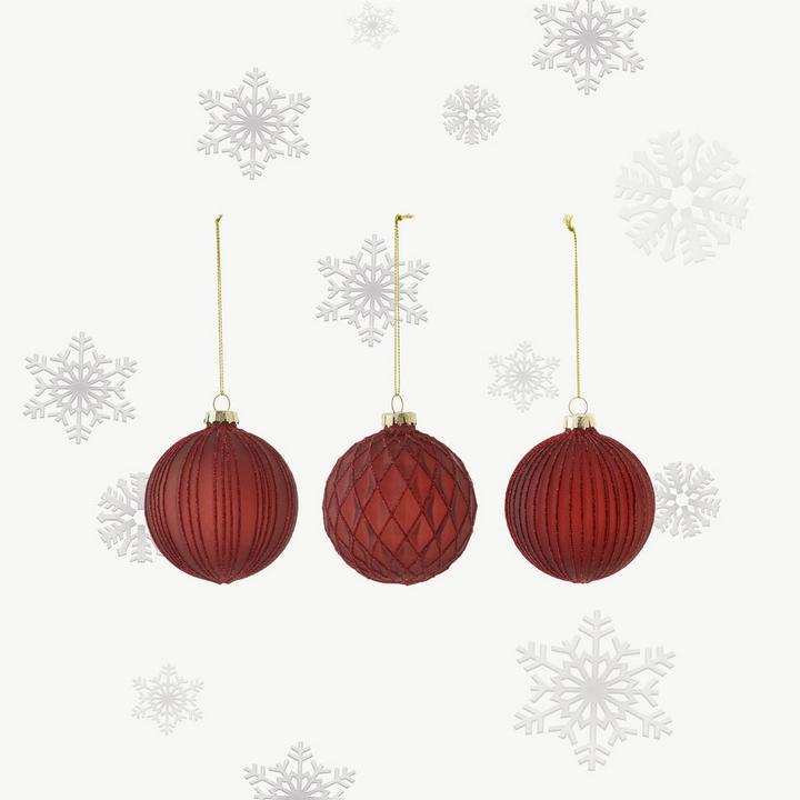 Drei rote Christbaumkugeln