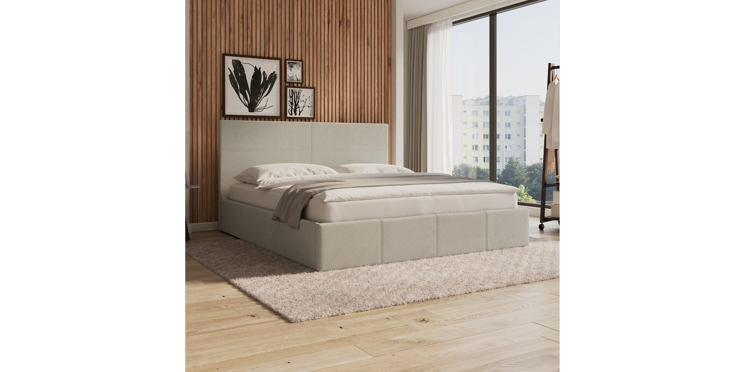 Graues Polsterbett vor naturfarbenem Akustikpaneel