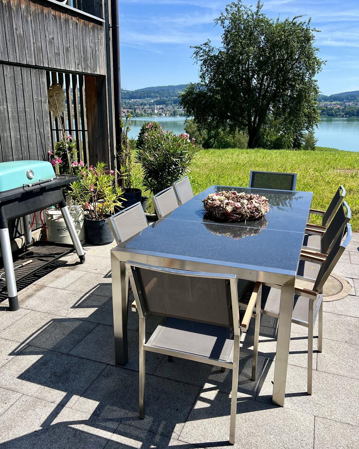 GARTENTISCH Edelstahl/Naturstein schwarz poliert 220/100 cm Grosseto - Silberfarben/Schwarz, Stein (220/100/74cm) - Beliani
