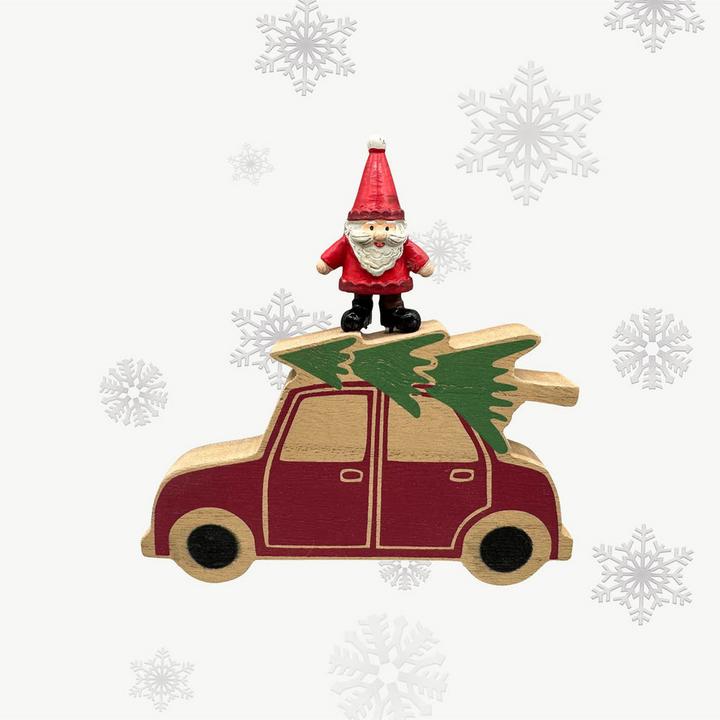 Auto mit Tannenbaum und Weihnachtsmann auf dem Dach