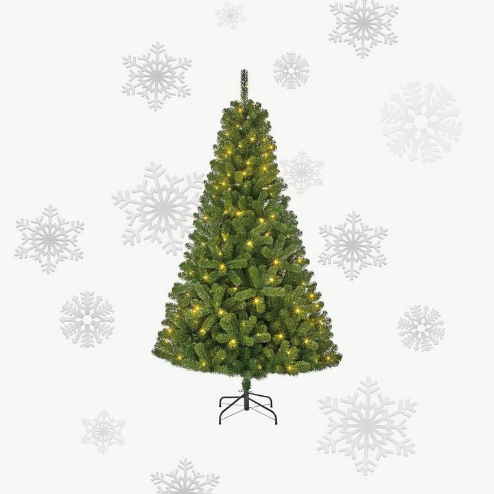 Weihnachtsbaum vor hellem Hintergrund mit Schneeflocken rundherum