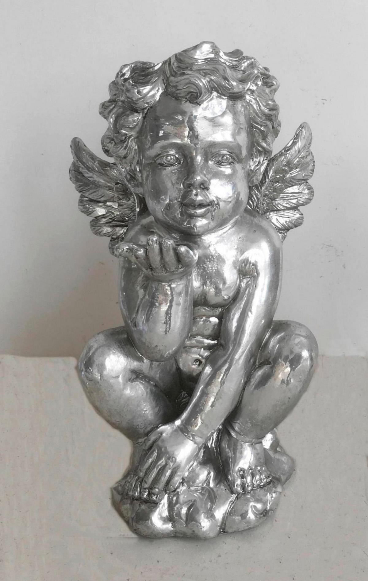 ANIOŁ DEKORACYJNY 98060 - kolor srebrny, Trend, tworzywo sztuczne (18/17/32cm) - X-Mas